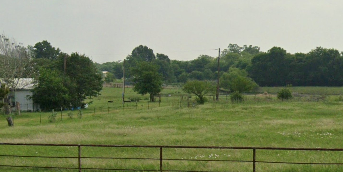 8797 FM 2450 pasture and outbuilding